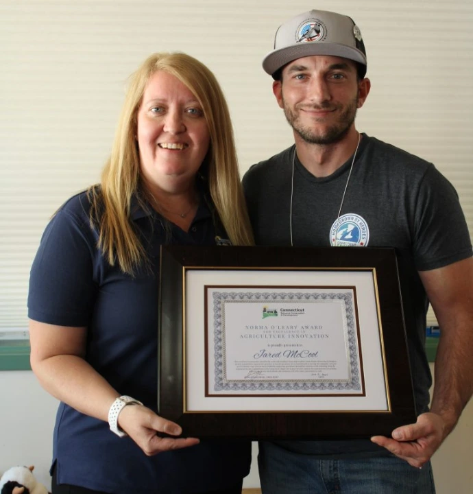 Steadfast Farms team receiving industry recognition award