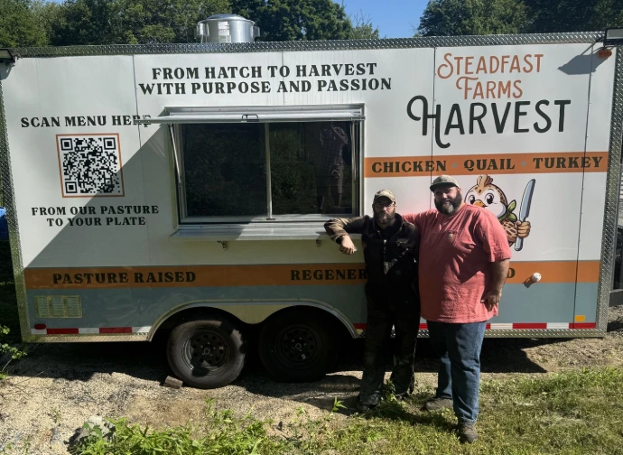 Aaron and Jared McCool in front of the Harvest Unit